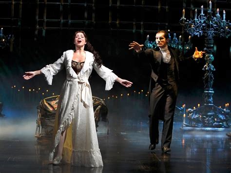 What happens at the end of Phantom of the Opera, and why do we still care about the chandelier?